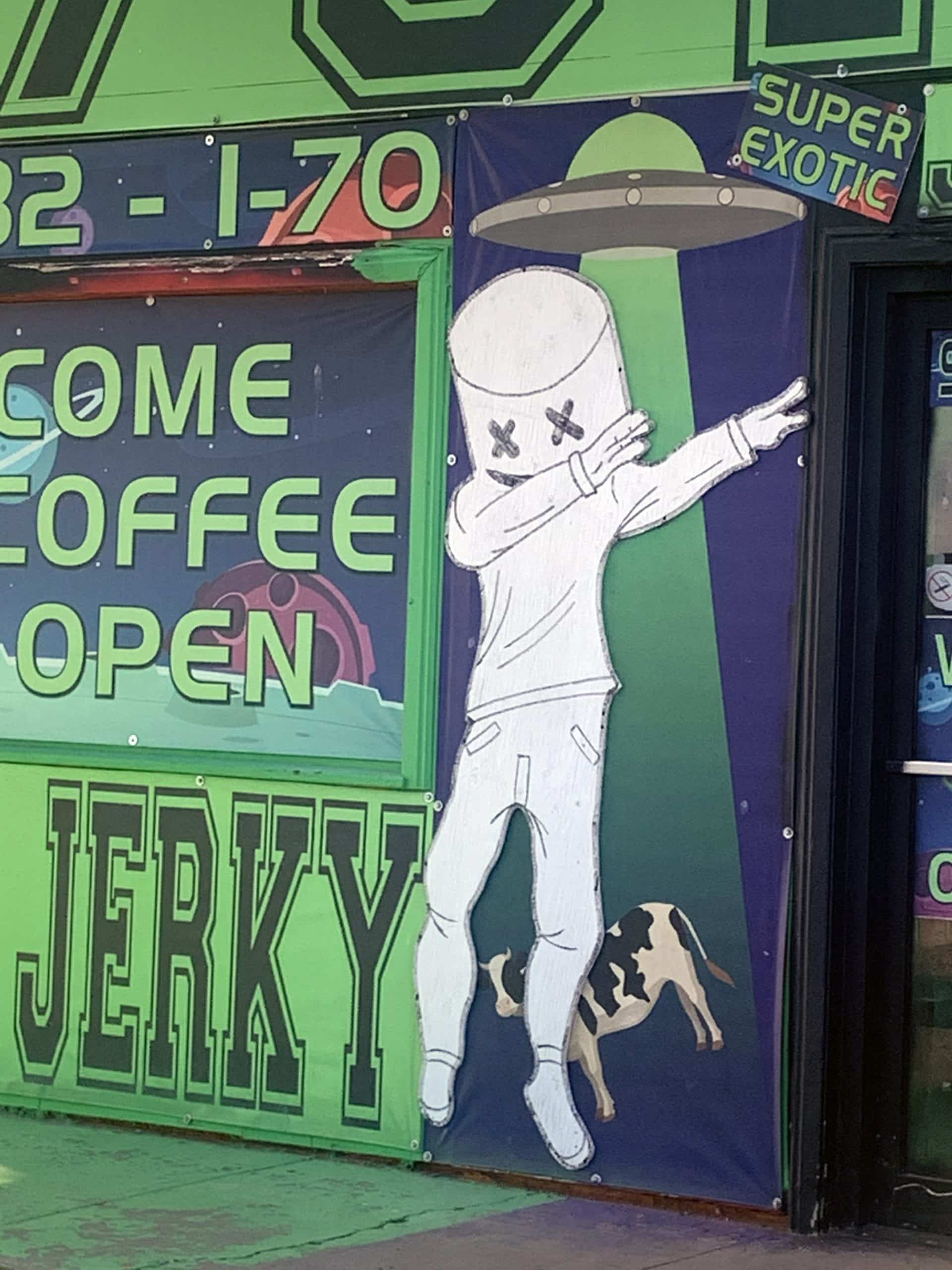 a painting of "Marshmello" a recording artist who wears a helmet shaped like a marshmallow