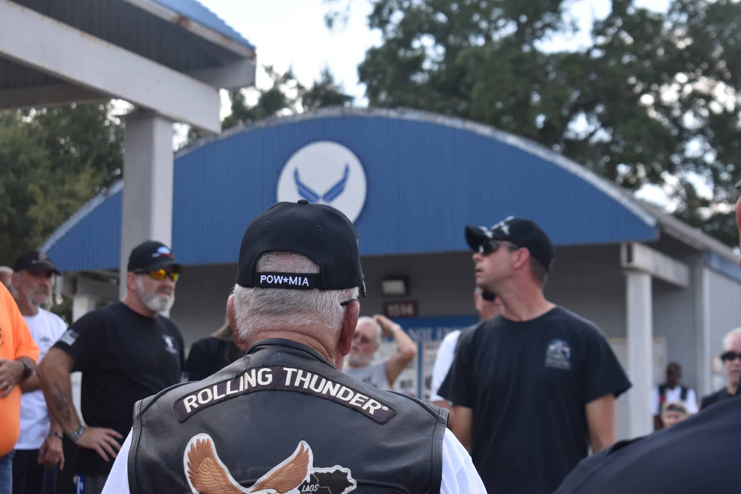 An elderly man wearing a "rolling thunder" leather jacket.