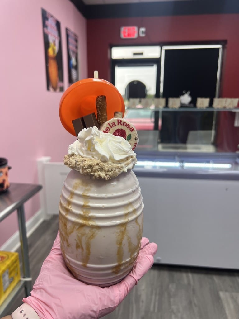 A beverage called "milkshake supreme" topped with Mexican candy.